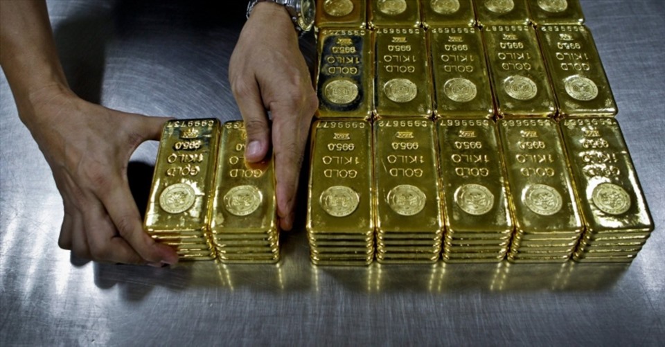 Giá vàng biến động mạnh nếu Mỹ tăng thuế. Ảnh: AFP