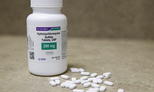 Hội đồng chuyên gia WHO khuyến cáo về việc dùng hydroxychloroquine trong điều trị COVID-19. Ảnh: AFP.