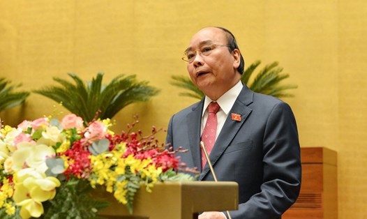 Thủ tướng Chính phủ Nguyễn Xuân Phúc trình bày báo cáo công tác nhiệm kỳ Chính phủ. Ảnh: Quốc hội