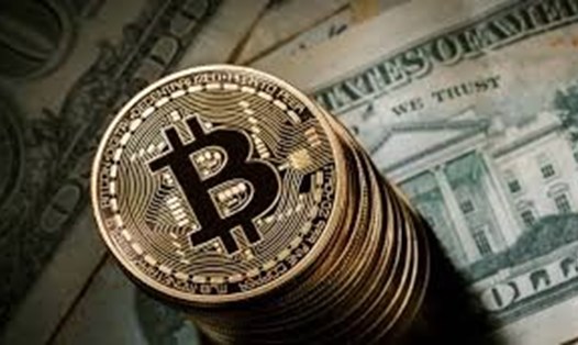 Giá bitcoin được dự báo có thể lên đến 1 triệu USD trong 10 năm tới. Ảnh: AFP