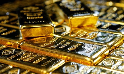 Giá vàng thế giới mất 20% giá trị so với mức kỷ lục tháng 8 năm 2020. Ảnh: AFP