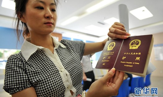 Hộ chiếu Trung Quốc tăng thứ bậc trong bảng xếp hạng hộ chiếu quyền lực nhất thế giới. Ảnh: Xinhua