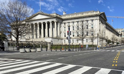 Tòa nhà Bộ Tài chính Mỹ. Bộ Tài chính Mỹ đã đưa Việt Nam và Thụy Sĩ ra khỏi danh sách các nước thao túng tiền tệ hôm 16.4. Ảnh: AFP.