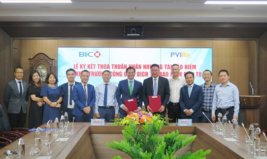 Lãnh đạo BIC và PVIRe đã chính thức khai trương cổng giao dịch tái bảo hiểm điện tử giữa hai đơn vị. Ảnh: BIC