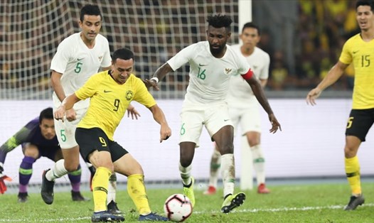 Tuyển Malaysia (áo vàng) muốn có nhiều thời gian để chuẩn bị cho vòng loại World Cup 2022. Ảnh: AFC.