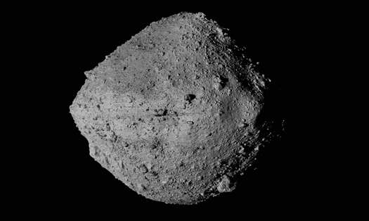 Tàu vũ trụ NASA thu thập mẫu đá trên tiểu hành tinh Bennu. Ảnh: NASA