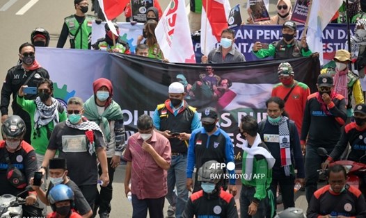 Một cuộc biểu tình chống xung đột bạo lực giữa Israel - Hamas ở Jakarta, Indonesia, vào ngày 18.5.2021. Ảnh: AFP