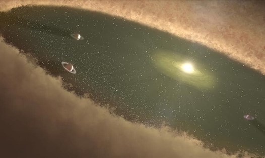 Một đĩa tiền hành hành tinh làm từ đá và khí bao quanh một ngôi sao trẻ. Ảnh: NASA.