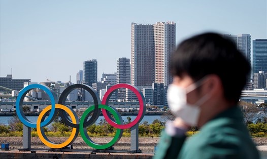 Giữa tình hình dịch COVID-19 hoành hành, nhiều người dân Nhật Bản muốn hoãn, huỷ tổ chức Olympic Tokyo. Ảnh: AFP