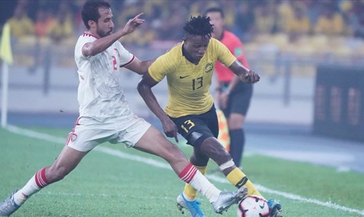 Tuyển Malaysia (áo vàng) từng thua UAE 0-10, 0-6 ở hai trận vòng loại World Cup 2022. Ảnh: AFC.