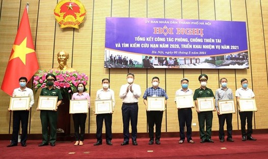 19 tập thể, cá nhân được khen thưởng tại hội nghị diễn ra ở Hà Nội. Ảnh: Nguyễn Hợp