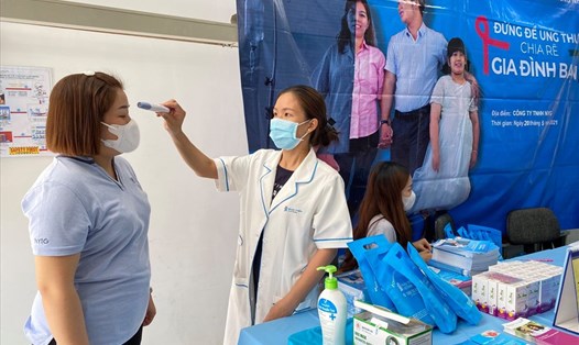 Người lao động tại KCN Long Khánh được chăm lo sức khoẻ và phòng dịch COVID-19. Ảnh: Hà Anh Chiến