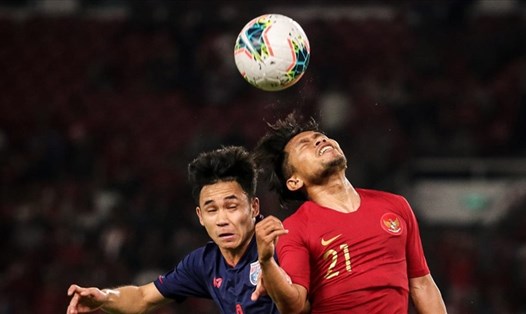 Tuyển Thái Lan (áo xanh) quyết tâm đánh bại Indonesia để gây sức ép lên tuyển Việt Nam. Ảnh: AFC.