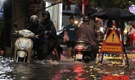 Cảnh báo ngập lụt do mưa lớn về chiều tối tại các tỉnh thành Bắc Bộ. Ảnh minh hoạ: Tô Thế.