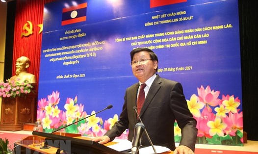 Tổng Bí thư, Chủ tịch nước Lào Thongloun Sisoulith nói chuyện tại Học viện Chính trị Quốc gia, sáng 29.6. Ảnh: TTXVN