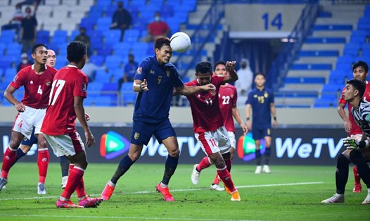 Tuyển Thái Lan (áo xanh) 2 lần dẫn trước Indonesia nhưng không bảo vệ được thành quả. Ảnh: AFC.