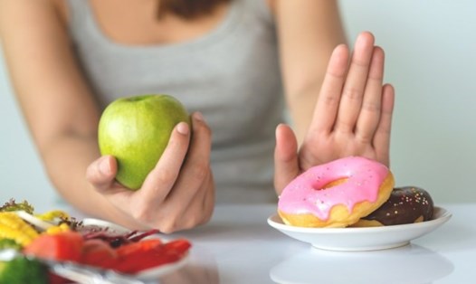 Tiêu thụ quá nhiều đường là một trong những thói quen xấu ảnh hưởng đến cơ thể bạn. Ảnh: AFP