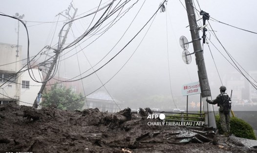 Mưa lớn gây lở đất ở Amita, Nhật Bản từ 1 tuần trước khiến 20 người vẫn còn đang mất tích. Ảnh: AFP