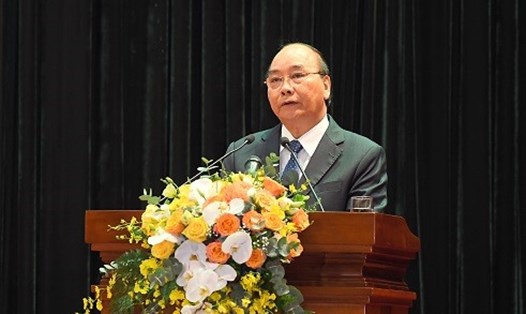 Chủ tịch nước Nguyễn Xuân Phúc tham dự và chỉ đạo buổi kỷ niệm 75 năm ngày truyền thống lực lượng an ninh nhân dân. Ảnh: Bộ Công an