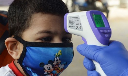 Mỹ có khả năng sẽ phê duyệt sử dụng khẩn cấp vaccine COVID-19 cho trẻ em dưới 12 tuổi vào giữa mùa đông năm nay. Ảnh: AFP