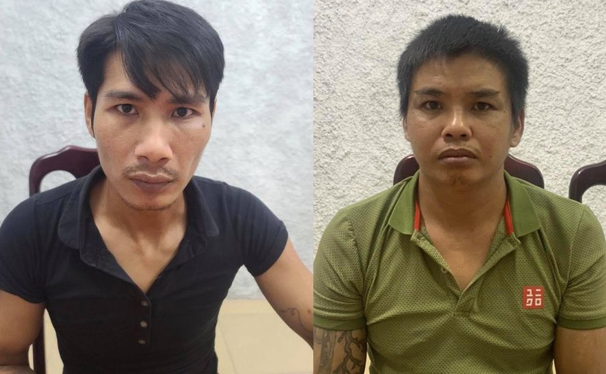Hai tên cướp Phúc và Chỉnh (từ trái qua) tại cơ quan công an. Ảnh: CAHN