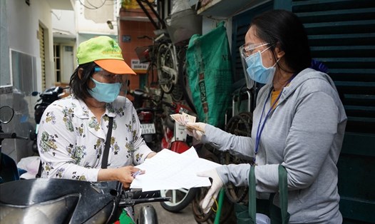 Hà Nội hỗ trợ 1,5 triệu đồng cho người lao động tự do bị ảnh hưởng bởi dịch COVID-19. Ảnh minh hoạ: Tú Linh