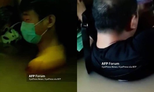 Nạn nhân trong vụ ngập tàu điện ngầm hôm 20.7 ở Trung Quốc. Ảnh: AFP