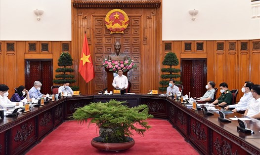 Thủ tướng Chính phủ Phạm Minh Chính chủ trì cuộc họp Ban Chỉ đạo Quốc gia phòng, chống dịch COVID-19 ngày 25.8 - Ảnh: Nhật Bắc