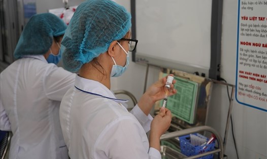 Hải Phòng có văn bản mượn tạm vaccine của TP.Hồ Chí Minh để tiêm cho người dân. Ảnh minh hoạ Đặng Luân