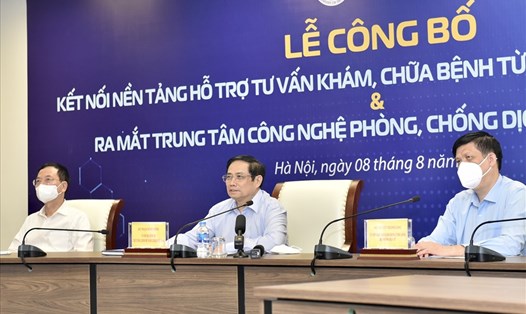 Thủ tướng Phạm Minh Chính dự lễ công bố kết nối Nền tảng hỗ trợ tư vấn khám, chữa bệnh từ xa (Telehealth) tới 100% tuyến huyện. Ảnh: Nhật Bắc
