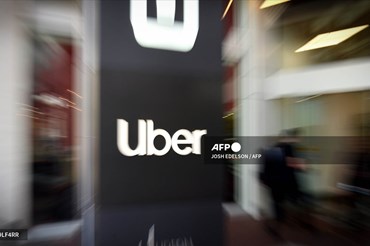 Logo Uber bên ngoài trụ sở công ty ở California, Mỹ. Ảnh: AFP