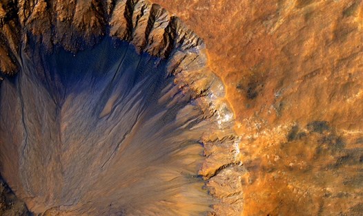 "Thủ phạm" khiến sông hồ biến mất khỏi sao Hỏa là do hành tinh này quá nhỏ. Ảnh: NASA/NatGeo