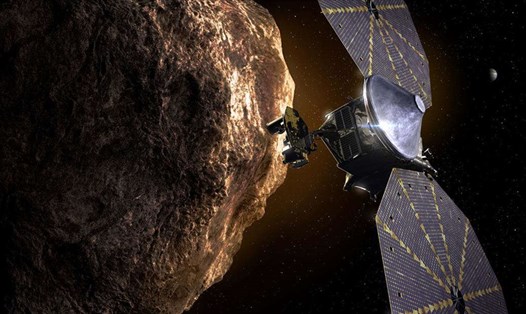Tàu vũ trụ Lucy đến gần một tiểu hành tinh Trojan của sao Mộc. Ảnh:  Southwest Research Institute