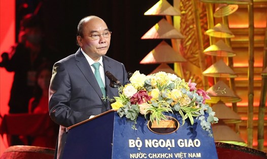Chủ tịch nước Nguyễn Xuân Phúc đọc diễn văn chúc Tết kiều bào. Ảnh: Hải Nguyễn