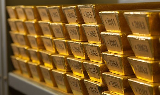 Giá vàng được dự báo có thể lên đến 2.100 USD/ounce trong năm 2022. Ảnh: AFP