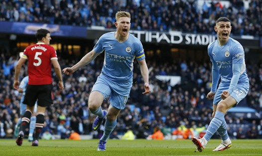 Man City trong trận thắng 4-1 trước Man United ở Derby Manchester mùa trước. Ảnh: AFP
