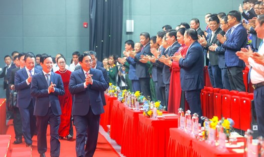 Thủ tướng Chính phủ Phạm Minh Chính cùng các đồng chí lãnh đạo Đảng, Nhà nước đến dự lễ kỷ niệm Ngày Doanh nhân Việt Nam và tôn vinh Doanh nhân Việt Nam tiêu biểu 2022. Ảnh: Nhật Bắc