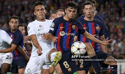 Barcelona và Inter Milan chia điểm trong trận cầu có 6 bàn thắng.  Ảnh: AFP
