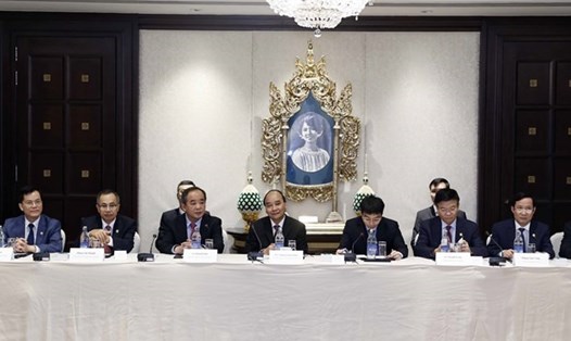 Chủ tịch nước Nguyễn Xuân Phúc dự tọa đàm cấp cao với Liên minh Doanh nghiệp Mỹ-APEC. Ảnh: TTXVN