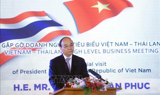 Chủ tịch nước Nguyễn Xuân Phúc phát biểu tại buổi gặp gỡ doanh nghiệp tiêu biểu Việt Nam - Thái Lan. Ảnh: TTXVN