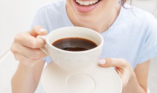 Uống cafe sẽ giúp thúc đẩy quá trình trao đổi chất tốt trong cơ thể. Ảnh: Xinhua