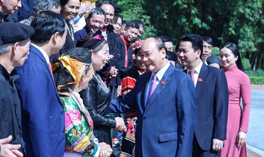 Chủ tịch nước Nguyễn Xuân Phúc với các đại biểu người có uy tín tiêu biểu tỉnh Hà Giang. Ảnh: VPCTN