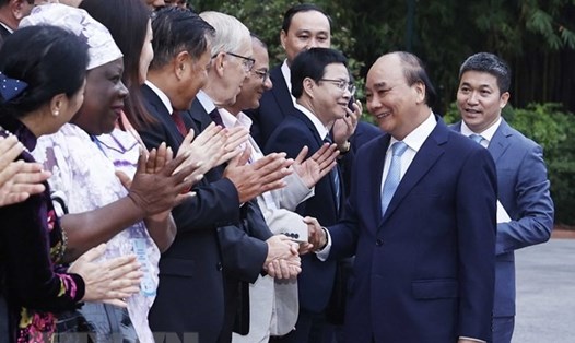 Chủ tịch nước Nguyễn Xuân Phúc tiếp đại biểu dự Đại hội 22 Hội đồng Hòa bình Thế giới. Ảnh: TTXVN
