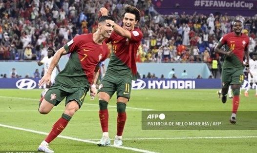 Ronaldo ghi bàn góp công giúp tuyển Bồ Đào Nha 3-2 trước Ghana. Ảnh: AFP