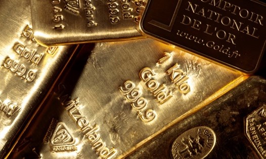 Giá vàng trong nước và thế giới đồng loạt điều chỉnh suy giảm. Ảnh: AFP