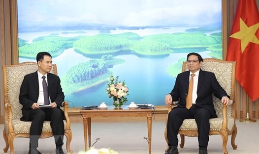 Thủ tướng Phạm Minh Chính tiếp Bộ trưởng Bộ Công thương Lào Malaythong Kommasith. Ảnh: TTXVN