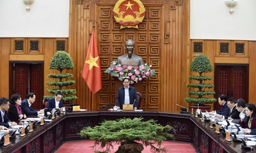 Thủ tướng Phạm Minh Chính chủ trì cuộc họp về điều hành chính sách tài khóa, tiền tệ, kinh tế vĩ mô. Ảnh: Nhật Bắc