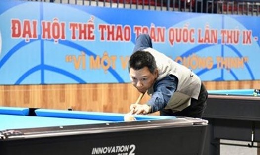 Cơ thủ Nguyễn Phúc Long thi đấu nội dung Pool 9 tại Đại hội Thể dục Thể thao toàn quốc. Ảnh: Tổng cục TDTD