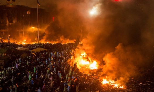Người biểu tình đụng độ với cảnh sát ở Kiev, Ukraina, tháng 2.2014. Ảnh: Getty
