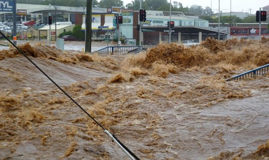 Mưa bão nghiêm trọng đổ bộ bang Queensland, Australia gây lũ lụt khiến 7 người thiệt mạng. Ảnh: AFP